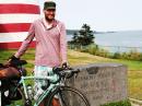 Cyclist Tom Andersen, OZ1AA/K9DXX, visits Maine's West Quoddy Head Light, touted as the easternmost point in the US. [Rick Lindquist, WW1ME, photo]